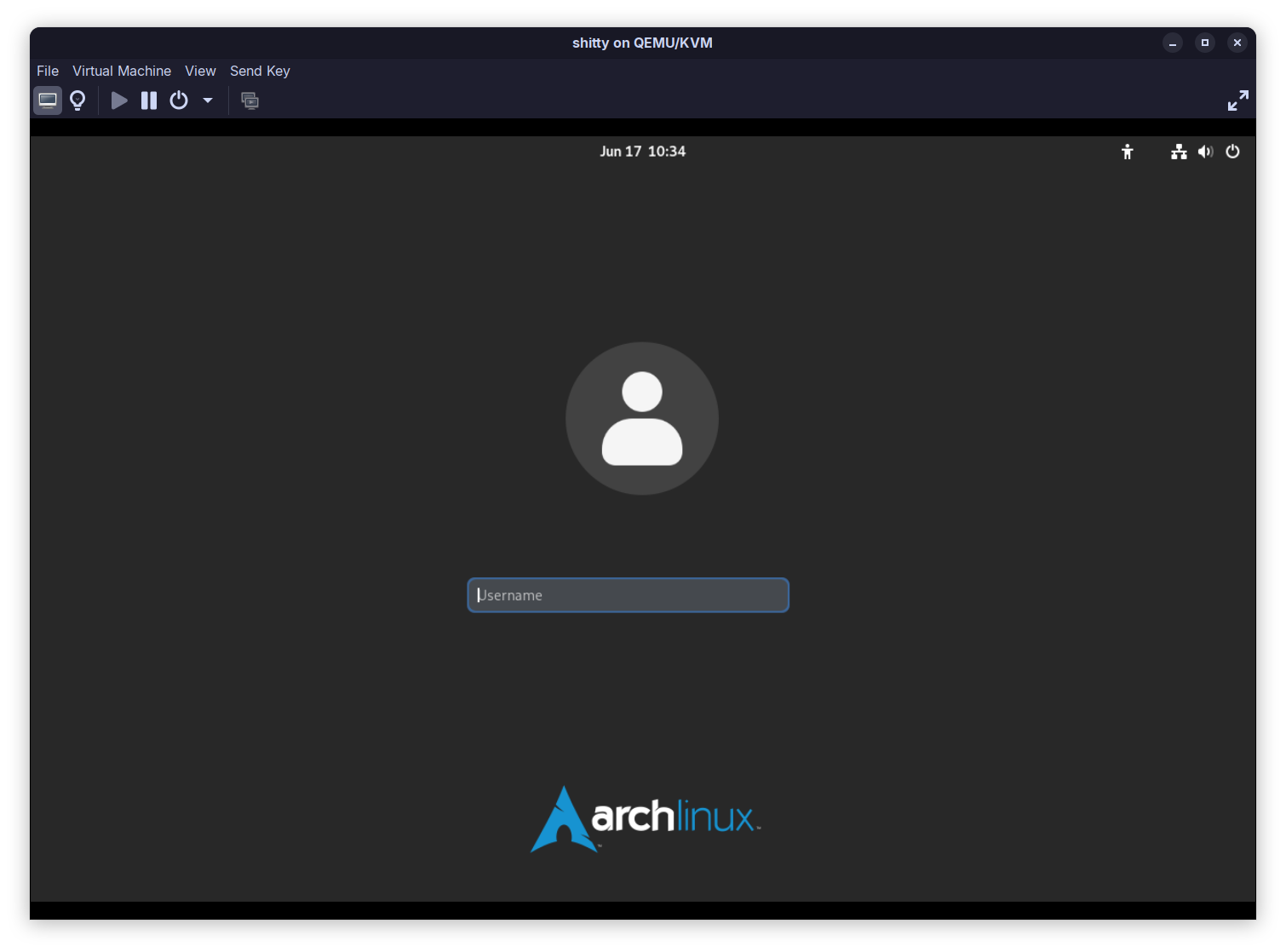 blank graphical login prompt, empty username, Arch Linux logo below